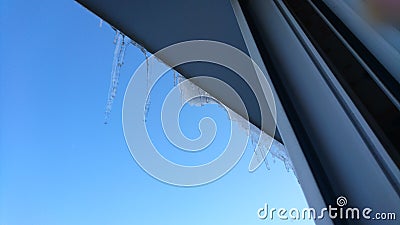 Spring, ice, icicles, water, roof, icicles on the roof, melting icicles Stock Photo